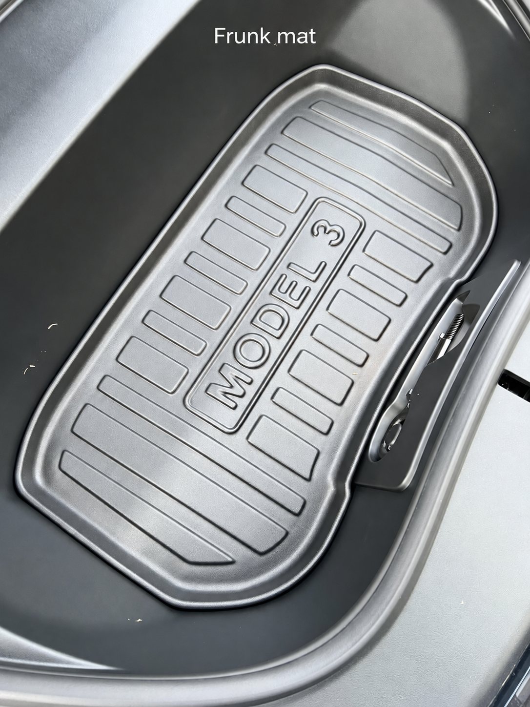 Frunk mat installed in the front storage compartment of a Highland Model 3